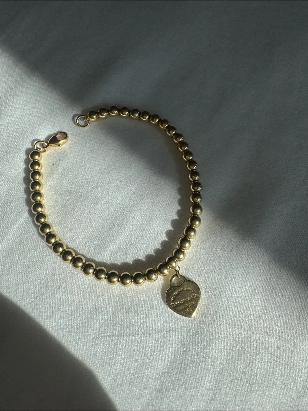 Tiffany and Co. Return to Tiffany 18k Gold 4mm beaded bracelet.  6.5 inches long